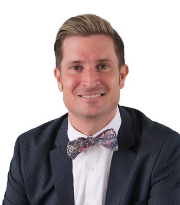Portrait of Nicholas Buchanan, REALTOR®.